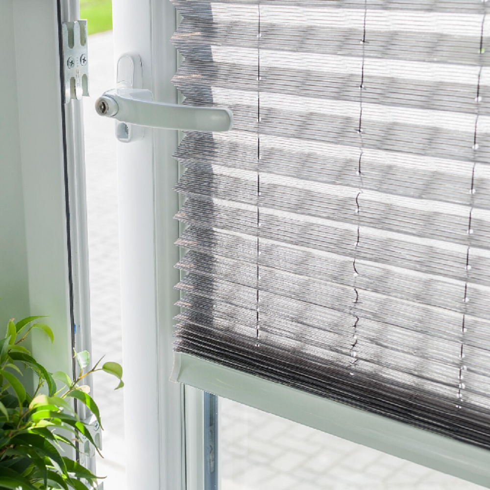 INTU Pleated Blind behind handle INTU Pleated Blind behind handle